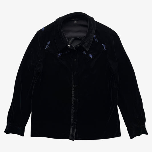 Women's Maje black velour shirt with embroidered floral details on a white background.