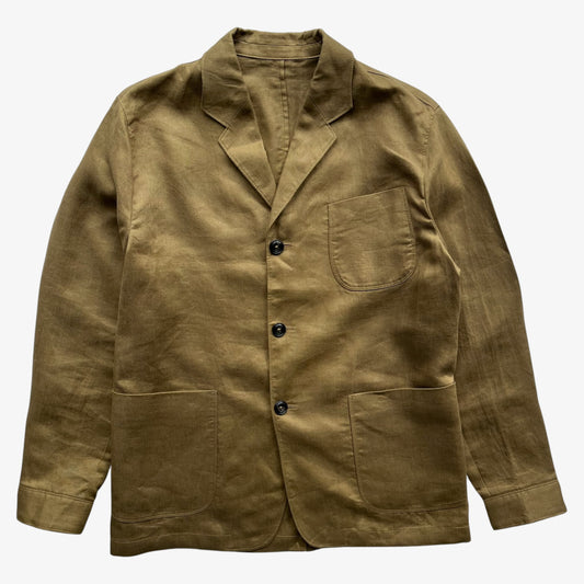 A brown women's blazer with a single-breasted button closure, a chest pocket, and two large lower patch pockets, laid flat against a light grey background.