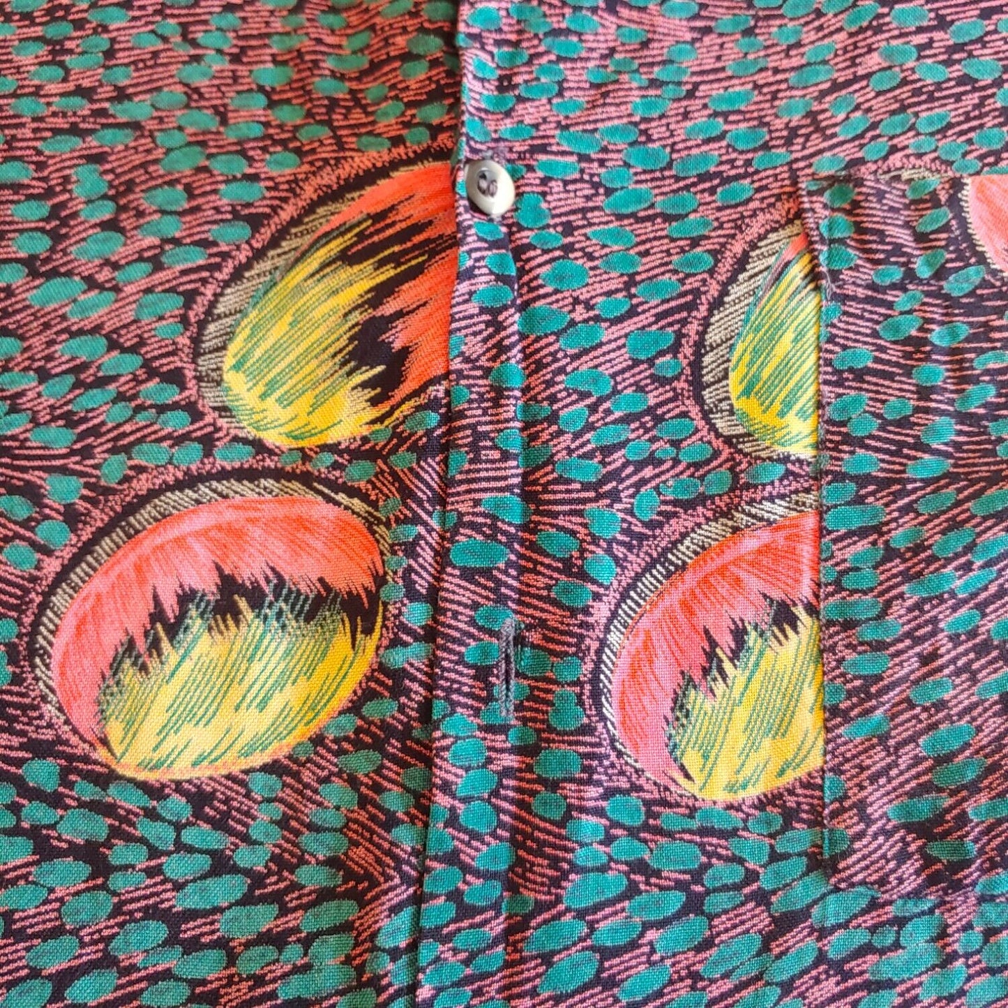 Close up of vintage abstract colourful pattern of American Crusader shirt.