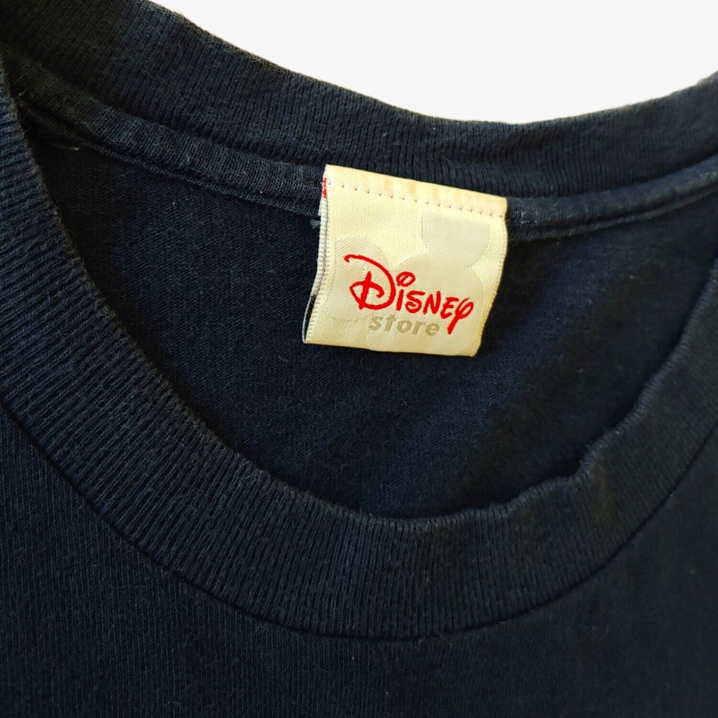 Label of vintage 90s Disney Winnie The Pooh true friends t-shirt.