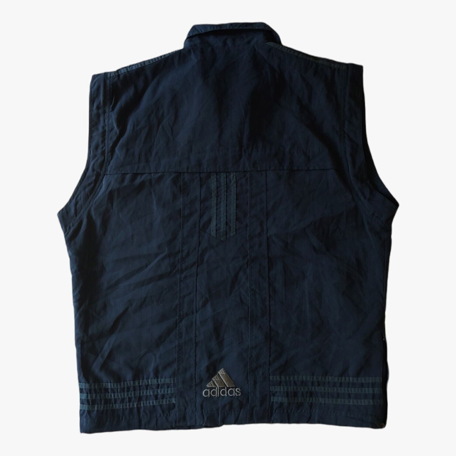 Back of vintage 90s men's Adidas Equipment navy tactical vest.