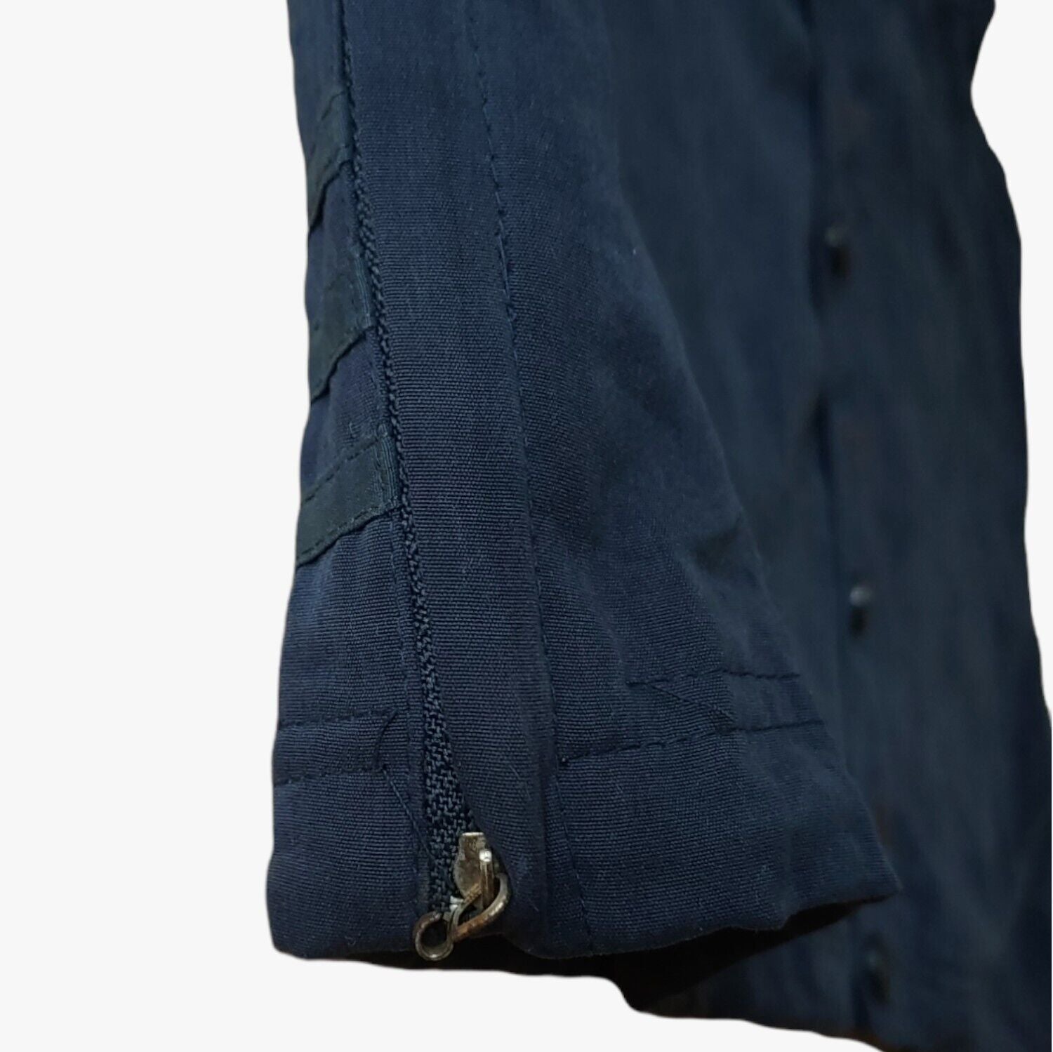 Zipper on vintage 90s men's Adidas Equipment navy tactical vest.