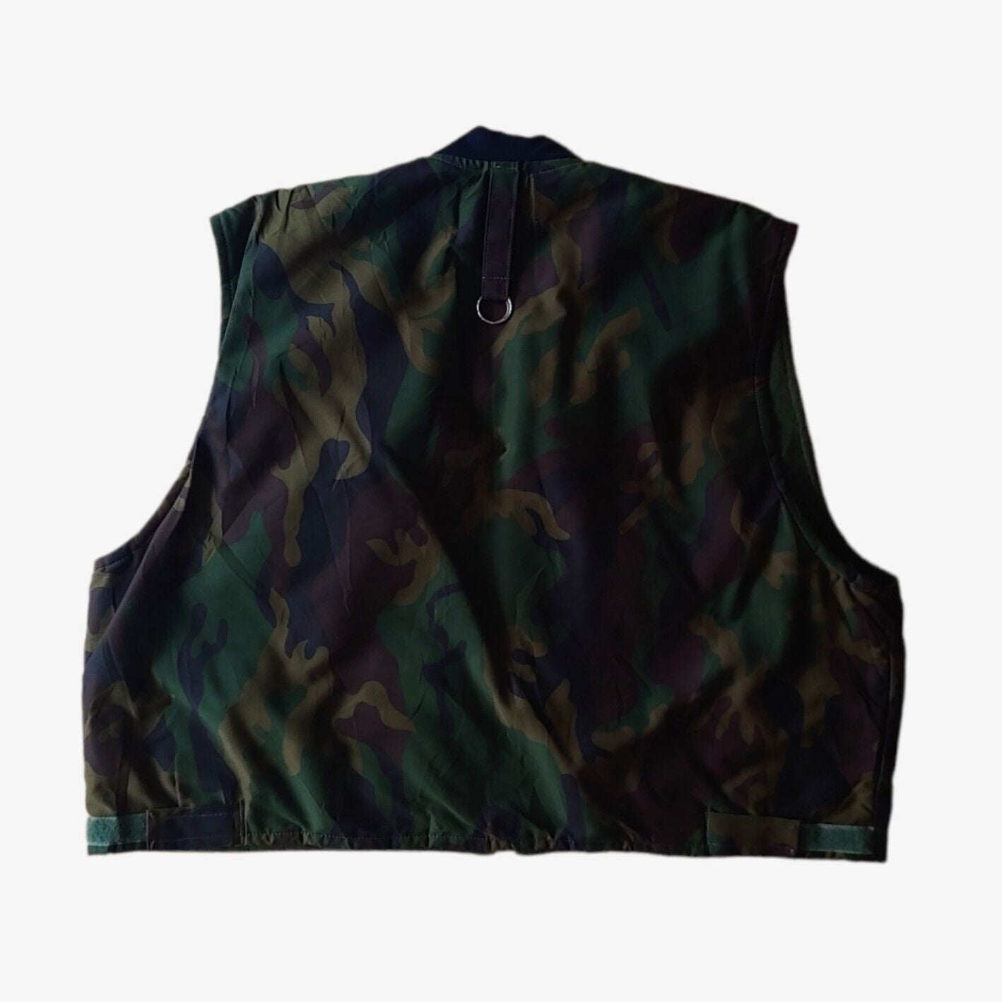 Back of vintage 90s New Contrast camouflage hunting utility gilet.