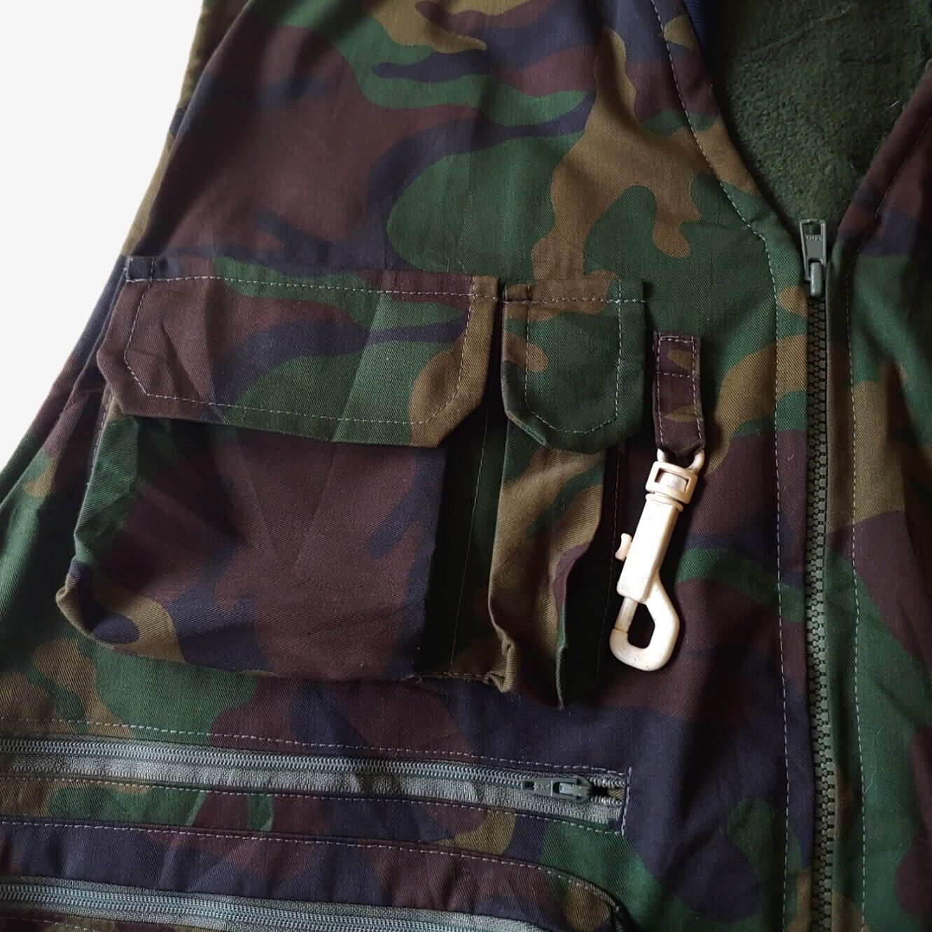 Tactical pockets on vintage 90s New Contrast camouflage hunting utility gilet.