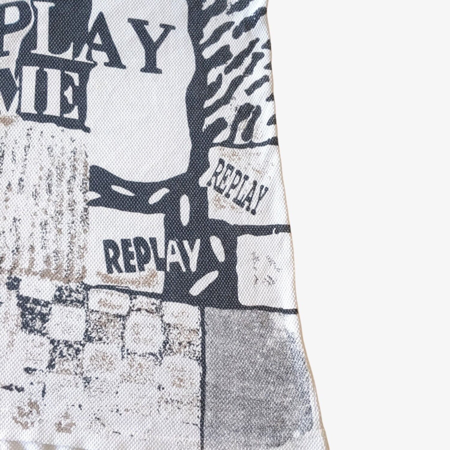 Close up of vintage 90s Replay all over print ribbed t-shirt.