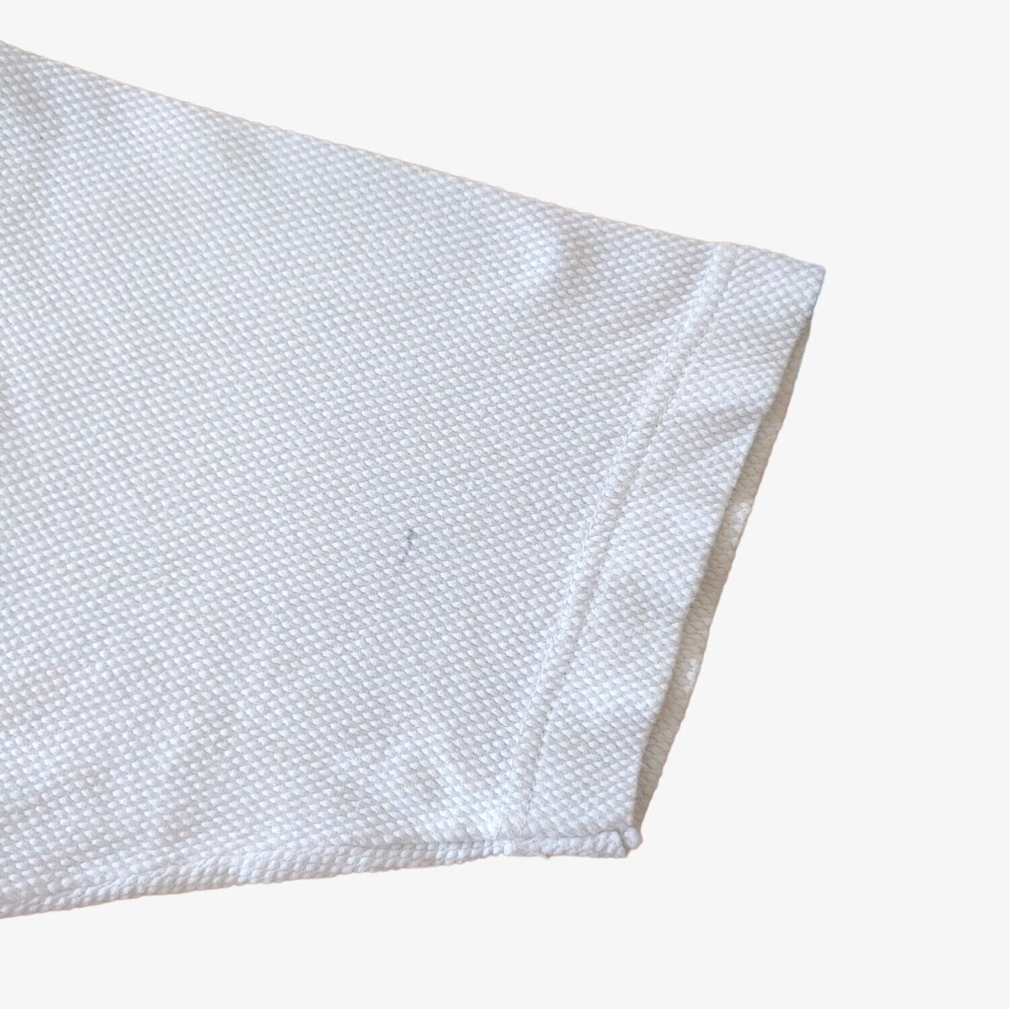 Wear on vintage 90s Replay all over print ribbed t-shirt.