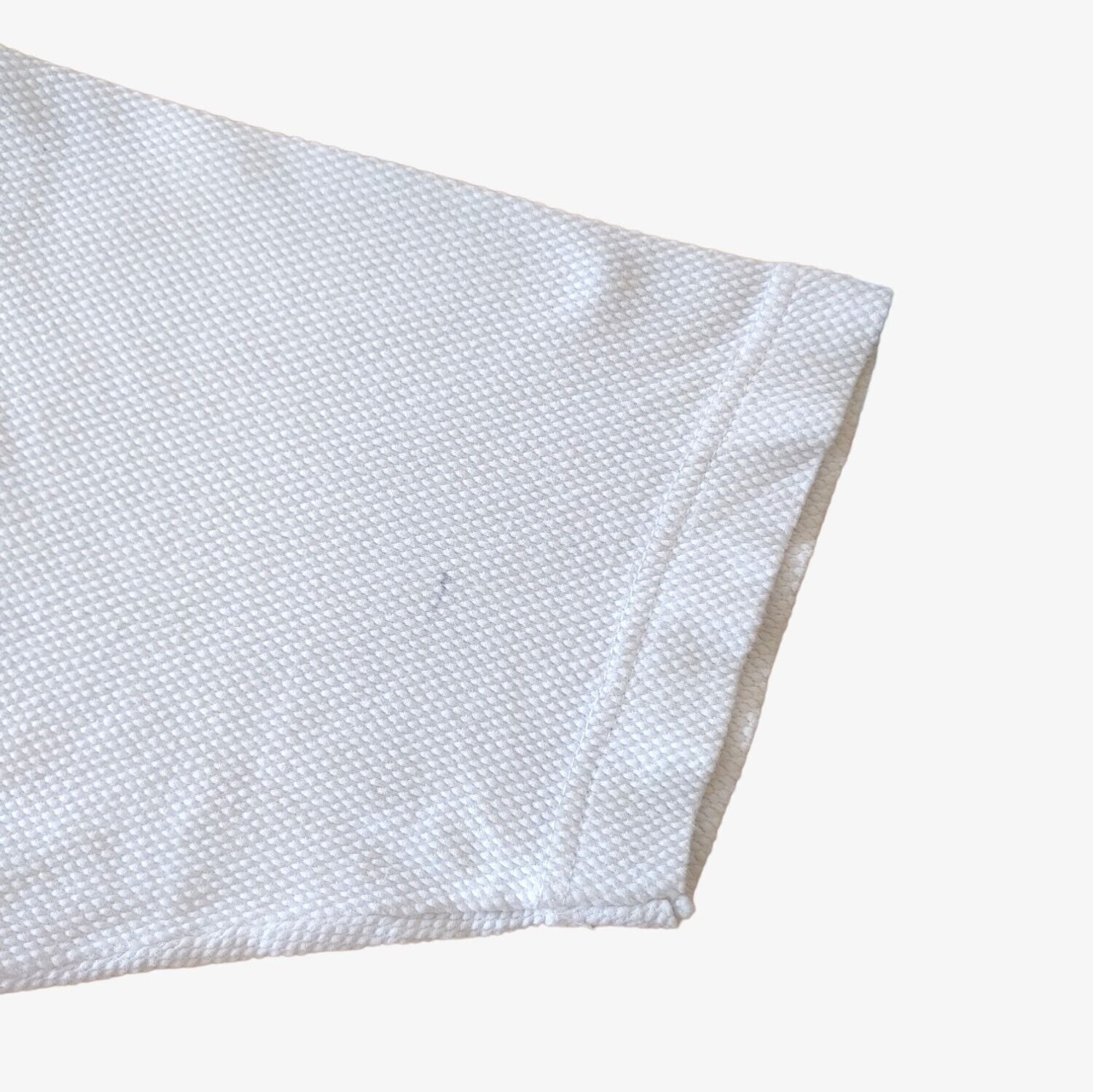 Wear on vintage 90s Replay all over print ribbed t-shirt.