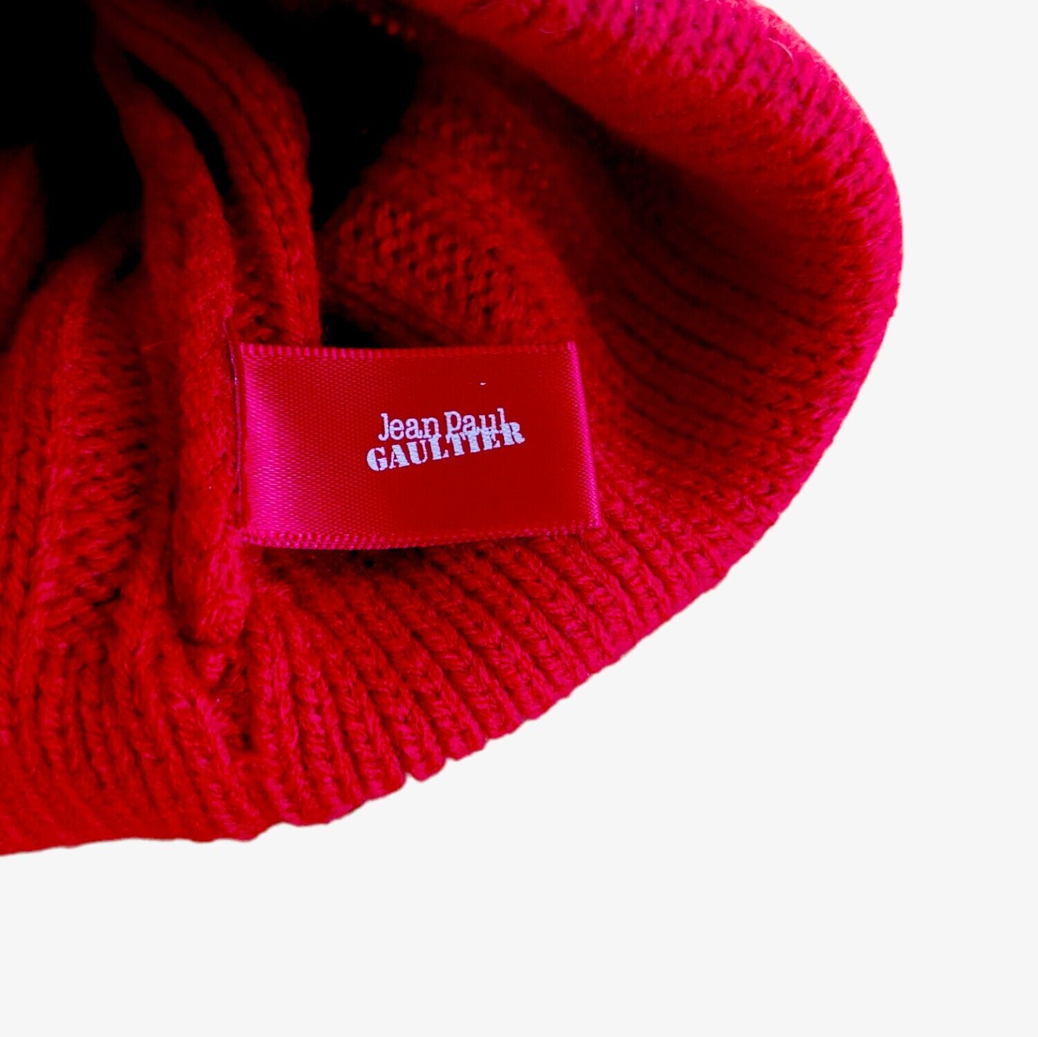 Label of vintage Y2K Jean Paul Gaultier beanie.