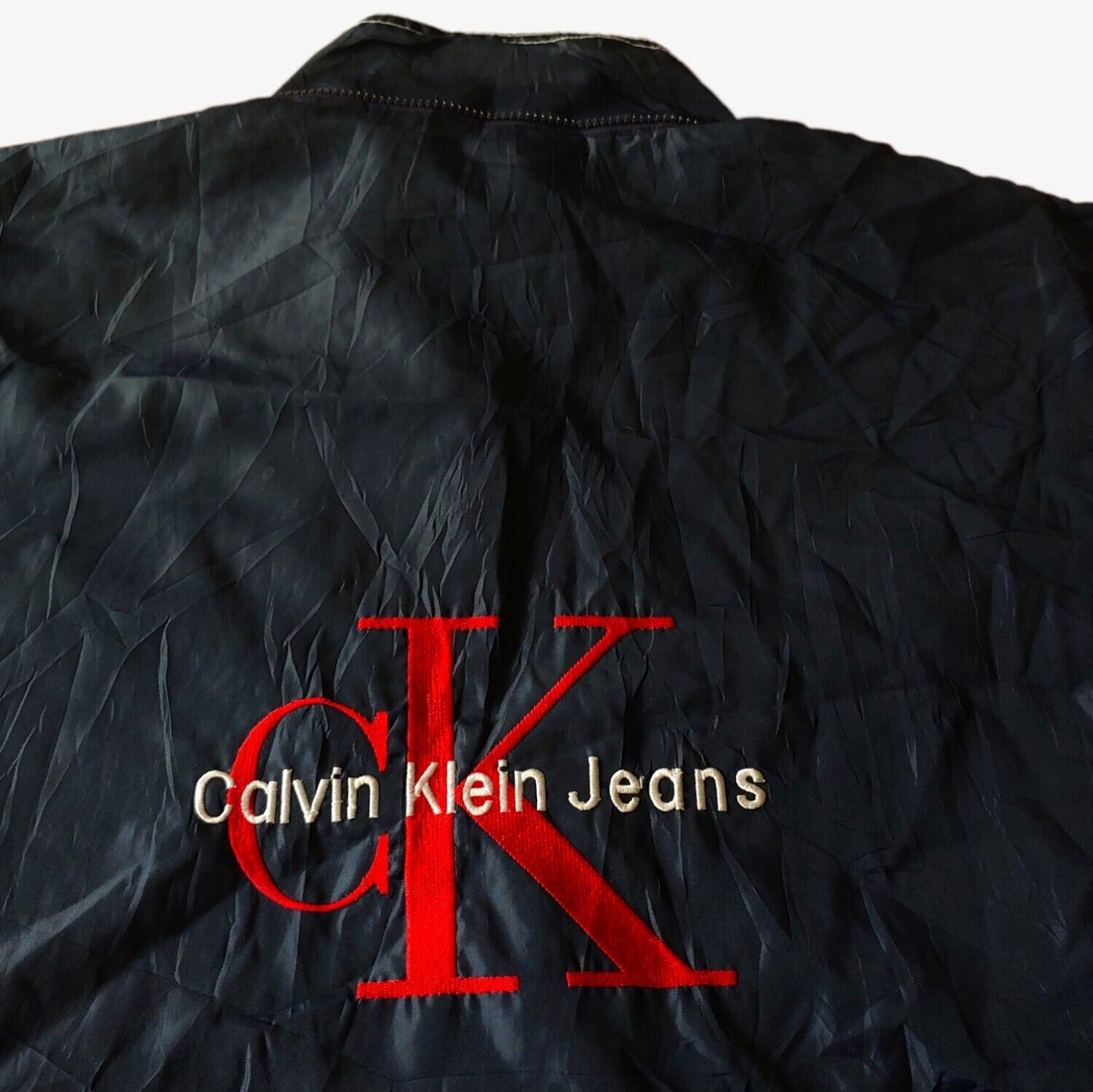 Vintage 1990s Calvin Klein Jeans CK Tape Logo Jacket Gilet With Removable Arms Back Logo - Casspios Dream