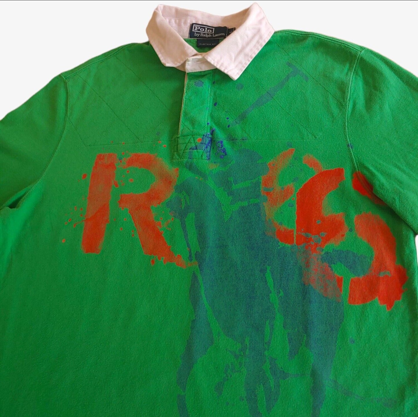 Vintage 90s Polo Ralph Lauren Green Long Sleeve Rugby Shirt With Big Spell Out Polo Player Logo Graphic Print Front - Casspios Dream